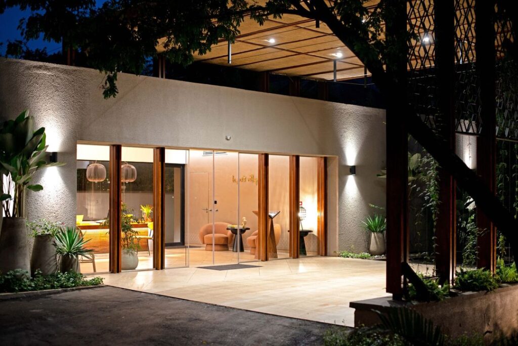 A contemporary house featuring a spacious glass door and an entrance porch.