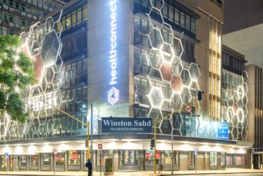 Recent Facade Renovation of Ina Building Features Hexagon Frames